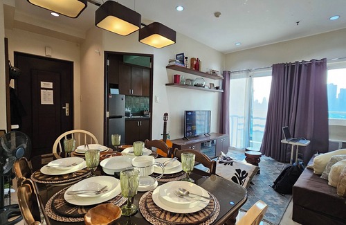 Katuparan Condo | Cozy Corner: Pet-Friendly 1BR with Sweeping City View