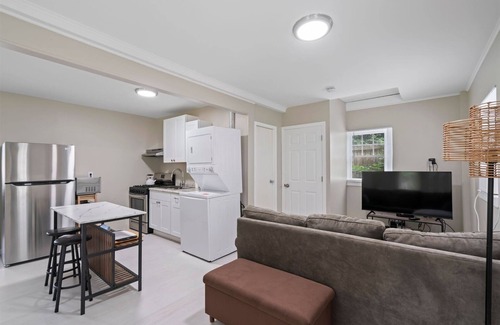Northport House | Cozy Cottage- Tucked Away and Private. Close to Village and Shopping.