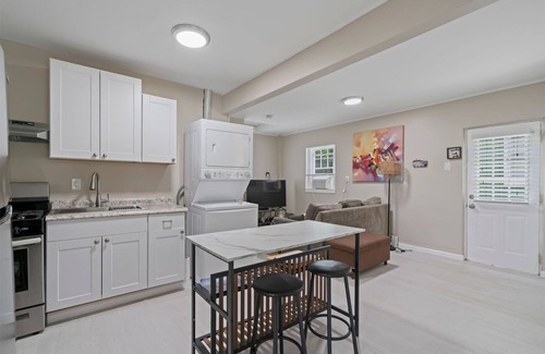 Northport House | Cozy Cottage- Tucked Away and Private. Close to Village and Shopping.