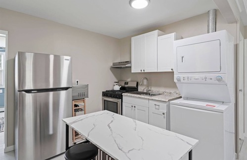 Northport House | Cozy Cottage- Tucked Away and Private. Close to Village and Shopping.