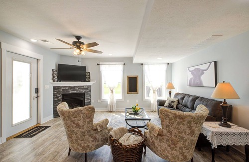 White Mills Apartment | Cozy farmhouse apartment on a working farm w/Highland Cattle, a hot tub & more!