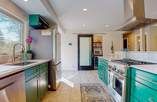 Crystal House | Cozy fenced in home with central AC, Fire table, WiFi, and large deck