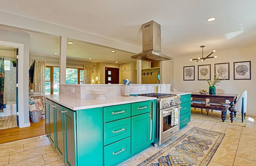 Crystal House | Cozy fenced in home with central AC, Fire table, WiFi, and large deck