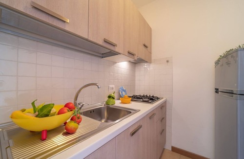 Lignano Pineta Apartment | Cozy flat with shared pool near the beach