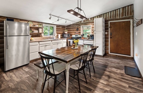 Spruce Pine Cabin | Cozy Hand Built Log Cabin Rocking Chair Porch King Bed
