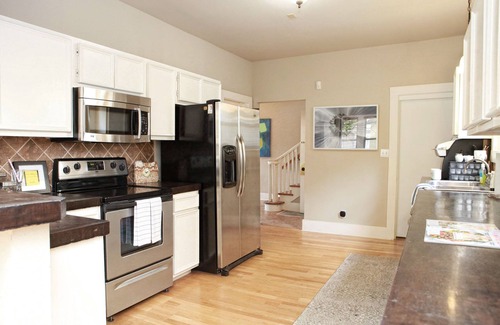 Cherry Street House | Cozy home near Gathering Place, Utica Square, fabulous dining and attractions.