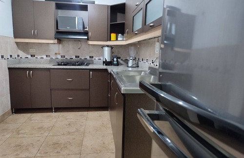 Medellin House | Cozy house 5 minutes from downtown Medellín. Close to malls and easy transport!