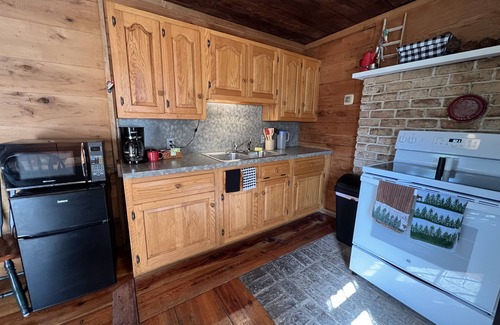 Elliottsburg Cabin | Cozy little cabin with creek access. Great for fishing or tubing!