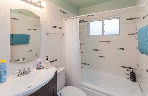 Midway House | Cozy mid century house with pool, hot tub, Dish Tv, WiFi, fireplace, waterfall