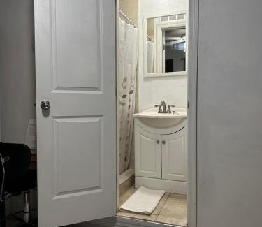 Tamiami Apartment | Cozy Queen Bed Studio with 60 Inch Smart TV, Netflix, AirPlay, Mini-Fridge, and 500 Mbps WiFi near FIU, Dolphin Mall, Airport
