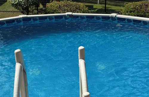 Oak Forest House | Cozy Ranch Style home with sun porch, above ground pool with fenced yard