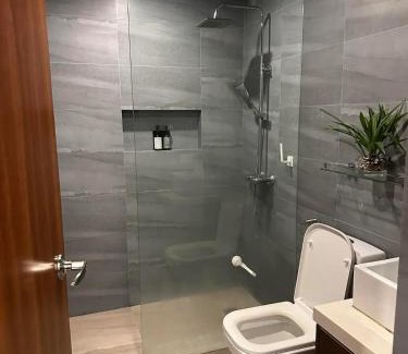 Kaunlaran Apartment | Cozy Spacious Pet Friendly Unit with Netflix Pool Gym