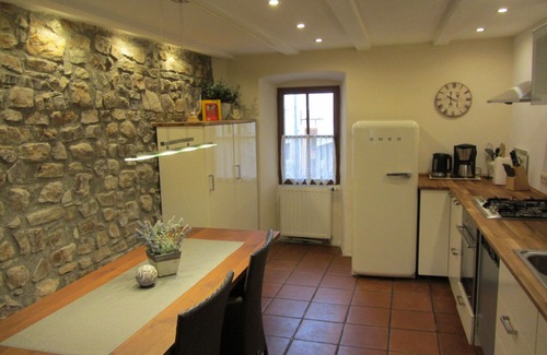 Muslone House | Cozy vacation home w/garden & patio & stunning view of the lake