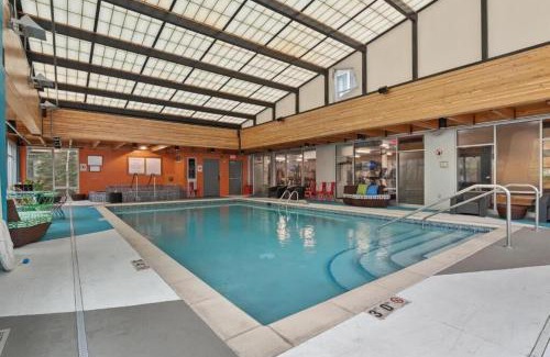 Mill District Apartment | CozySuites Mill District with pool, gym # 10