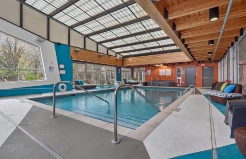 Mill District Apartment | CozySuites Mill District with pool, gym # 10