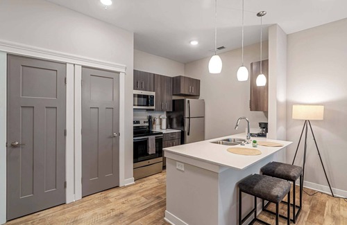 Mile Square Apartment | CozySuites - Penrose On Mass with pool & parking #7