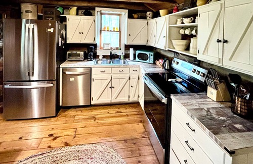 Elkin Cabin | Creek front family friendly rustic log cabin in the heart of NC wine country