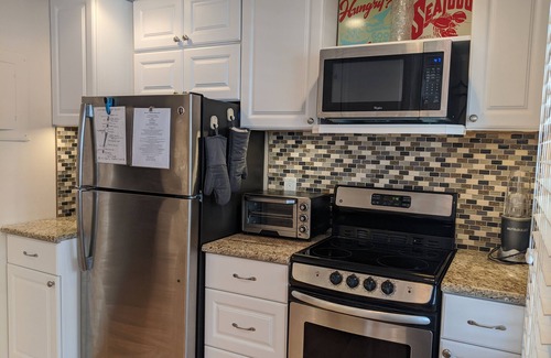 North Beach Haven Condo | Cute and cozy 2 bedroom Brant Beach condo across the street from the BEACH!
