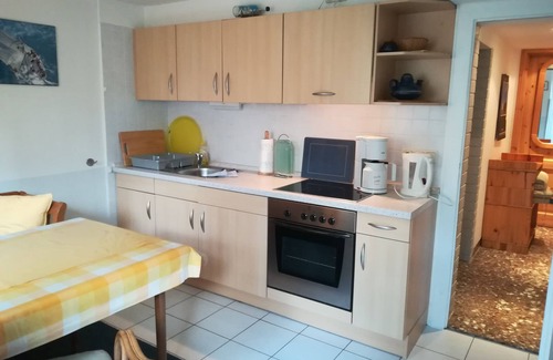 Warnemuende Apartment | Cute, small apartment with a terrace just 50 meters from the beach - with parking!