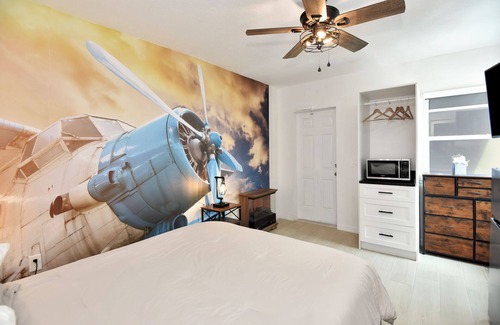 Daytona Beach Shores Hotel | Daytona Studio suite Queen bed kitchen walk in shower #3