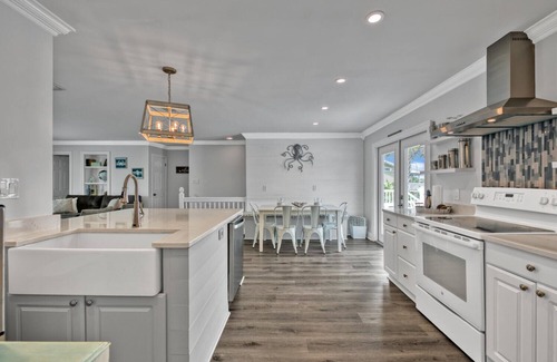 Holiday Isle House | Deep water access w/65ft inland slip! Private Beach access! Water Taxi!