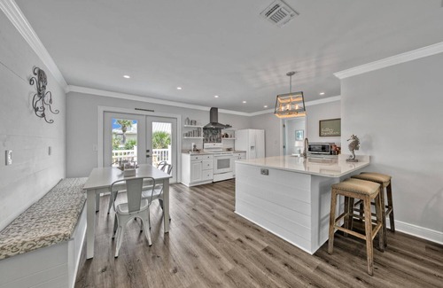 Holiday Isle House | Deep water access w/65ft inland slip! Private Beach access! Water Taxi!