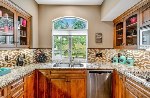 Gulf Breeze House | Delightful escape on the sound with beach access, dock, furnished deck, and WiFi
