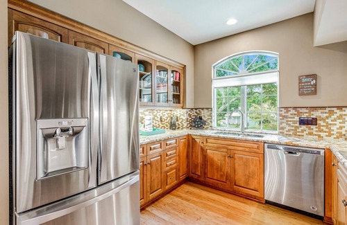 Gulf Breeze House | Delightful escape on the sound with beach access, dock, furnished deck, and WiFi