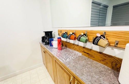 Chestermere House | Delightful ground level basement with AC in charming Chestermere