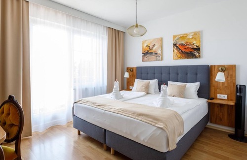 Morbisch am See Cottage | Deluxe Suite mit Kingsize Bett, 2 Schlafräume - Pension Laubenhof