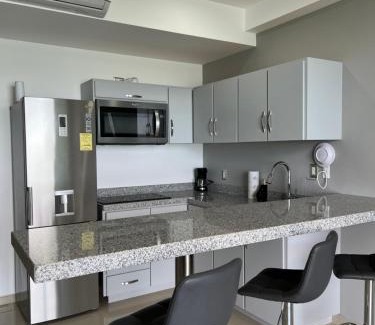 Zona Dorada Apartment | Departamento en Tramonto Resort con vista al mar