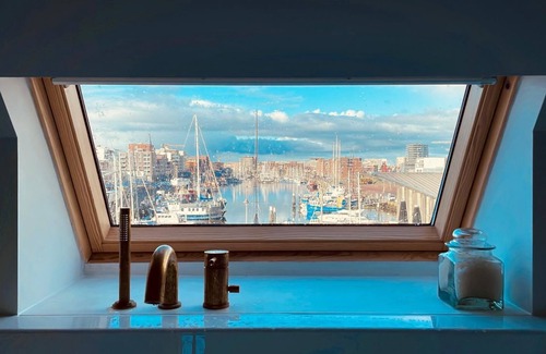 Vissershaven House | Design house overlooking harbor, 5-minute walk from the beach