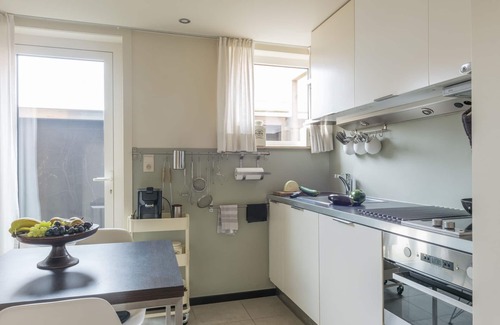 Mariakerke Apartment | Design vacation studio, close to the sea with private garden, parking and bicycle storage