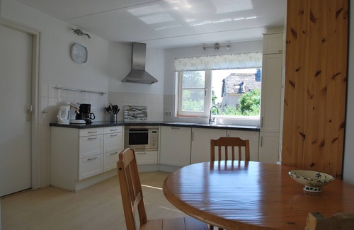 Makkum Cabin | Detached Duinvilla with a conservatory, a whirlpool, and two patios near the beach at the luxurious Beach Resort Makkum.