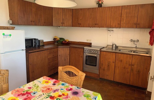Capoliveri House | detached holiday home with sea view, quiet but central, large enclosed garden