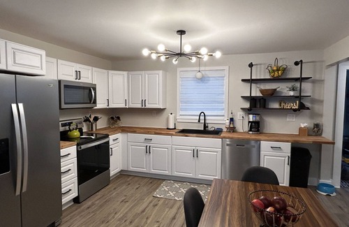 Alanson House | Devils Elbow Cottage on Crooked River with HOT TUB! Ski and Golf nearby!