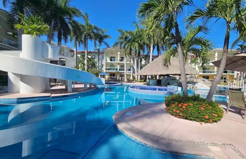 Puerto Marques Apartment | Diamante Lakes Condominium, across the street from Arena GNP
