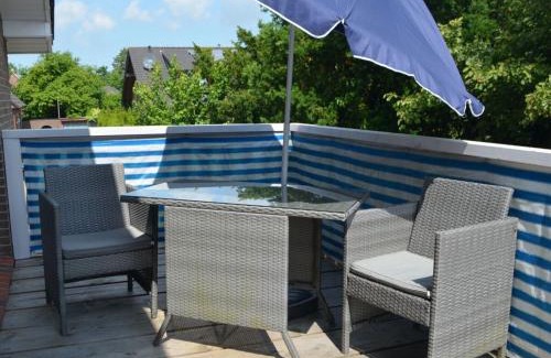 Wangerland House | Dinghy in the shiphouse