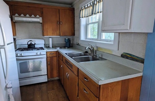 Northport House | Direct waterfront on Grand Traverse Bay , firepit, grill, large yard, dog ok