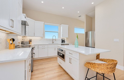Daytona Beach Shores House | Directly Across from the Beach with Pool -"Island in the Sun"