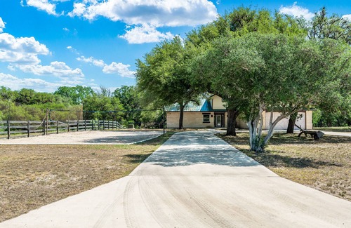 Concan House | Directly ON the Frio River in Concan, TX, private swimming pool, huge outdoor gathering space