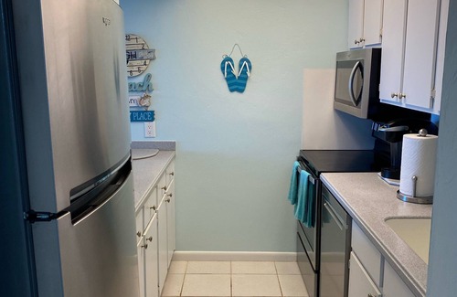 Bonita Springs Condo | Directly on the BEACH! Million dollar view of the ocean! Swim, walk or relax!