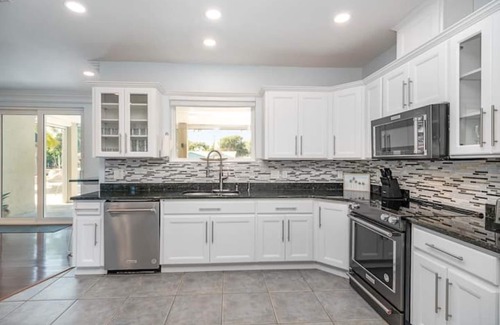 Cocoa Beach House | Dock, Kayaks, Pool, JACUZZI, ping pong, billiards, all beach gear, and more!