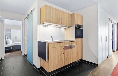 Wremen Apartment | Dog-friendly vacation apartment near the beach with sauna and balcony with beach chair -
