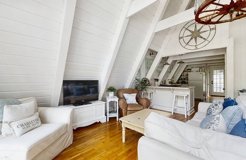 Charlevoix House | Dog-friendly A-frame home near beaches & downtown with firepit, deck, badminton