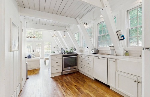Charlevoix House | Dog-friendly A-frame home near beaches & downtown with firepit, deck, badminton