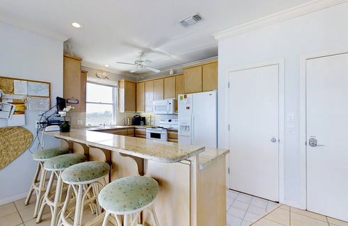 Treasure Beach Village House | Dog-friendly beachfront gem - community pool, tennis, washer/dryer, central AC