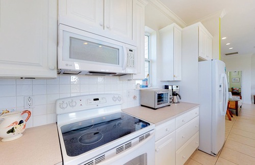 Treasure Beach Village House | Dog-friendly beach house with a pool, tennis, grill, washer/dryer, ocean views