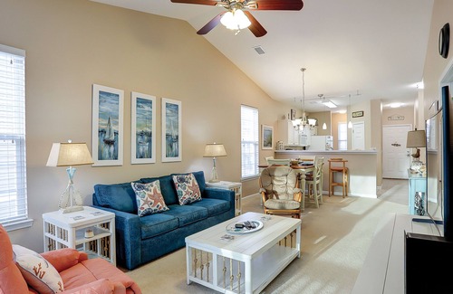 Sunset Beach Condo | Dog-friendly condo with balcony, pool access, & W/D - near beach and golf