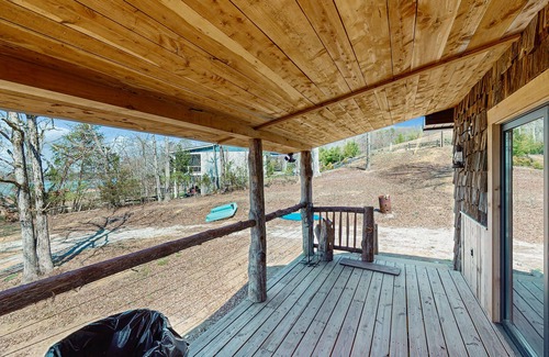 Dandridge Cabin | Dog friendly cozy lake front cabin w/Wi-Fi, dual decks, private dock, play yard